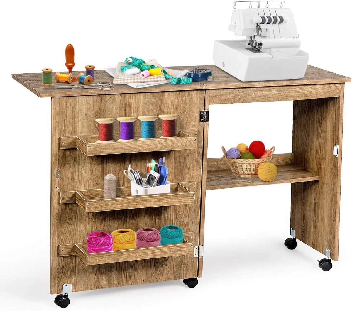 Test : table de couture pliante Costway avec étagères et roulettes